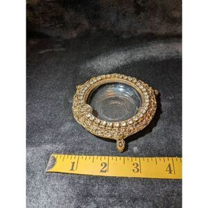 Vintage Celeste 70s brass and Rhinestone ashtray signed.